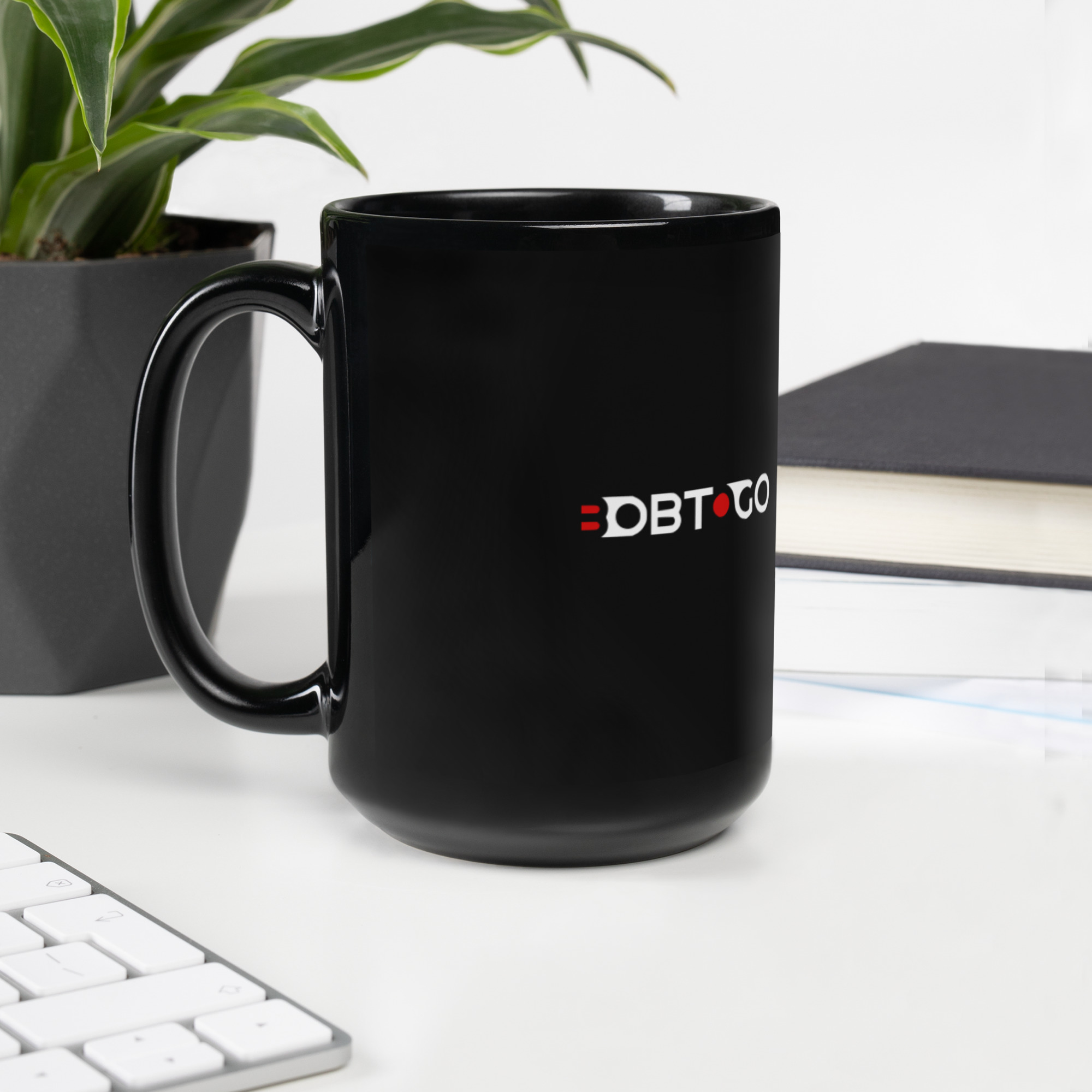 black-glossy-mug-black-15oz-handle-on-left-635a506ccf0db.jpg Black Glossy Mug - Image 1